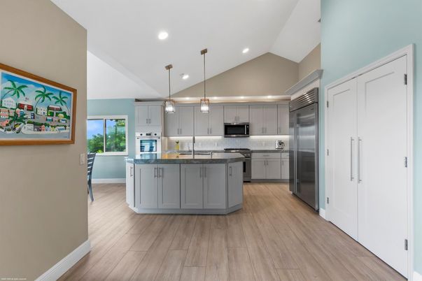 Interior, Kitchen, Pendant Lights, Recessed Lighting, Stainless Steel Appliances, Wood Texture Flooring