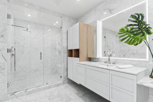 Bathroom, Dual Sink Vanities, Glass Shower, Interior, Marble, Marble Walls, Recessed Lighting