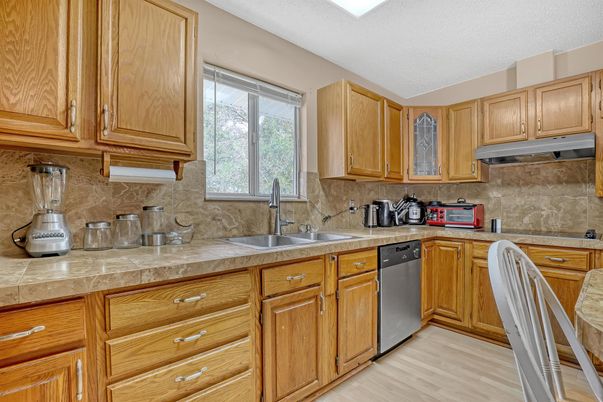Interior, Kitchen, Tile Countertops, Wood Texture Flooring