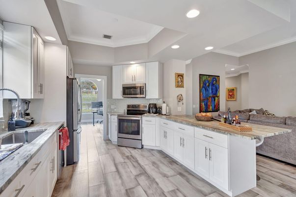 Interior, Kitchen, Recessed Lighting, Stainless Steel Appliances, Wood Texture Flooring