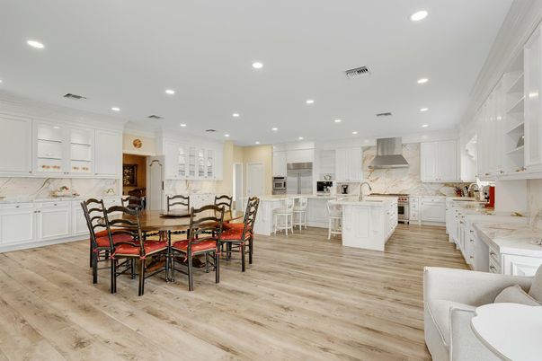 Dining room, Interior, Kitchen, Marble Walls, Recessed Lighting, Stainless Steel Appliances, Wood Texture Flooring