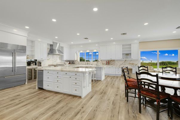 Dining room, Interior, Kitchen, Recessed Lighting, Stainless Steel Appliances, Wood Texture Flooring