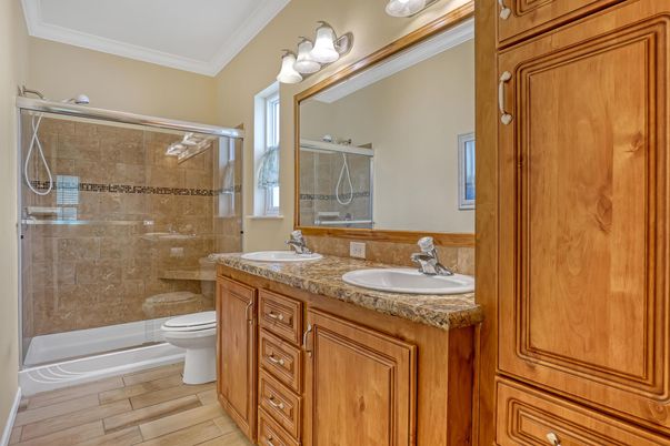 Bathroom, Dual Sink Vanities, Glass Shower, Interior, Wood Texture Flooring