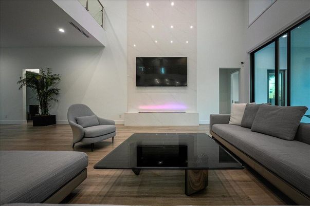 Fireplace, Interior, Living room, Marble Walls, Recessed Lighting, Wood Texture Flooring