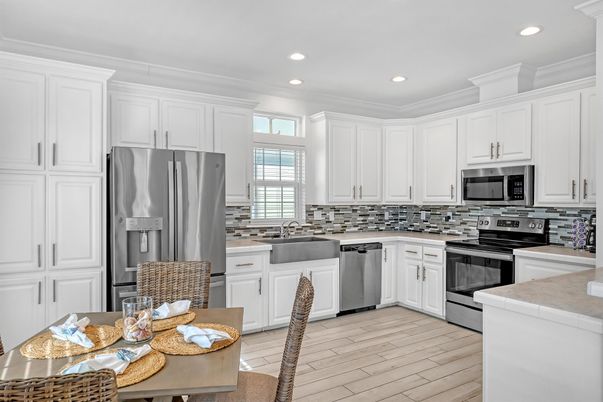 Interior, Kitchen, Recessed Lighting, Stainless Steel Appliances, Tile Countertops, Wood Texture Flooring