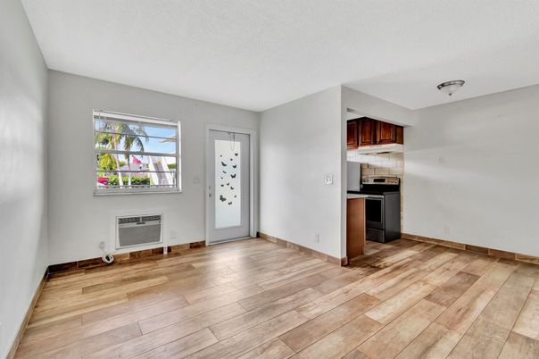 Empty room, Interior, Kitchen, Stainless Steel Appliances, Wood Texture Flooring