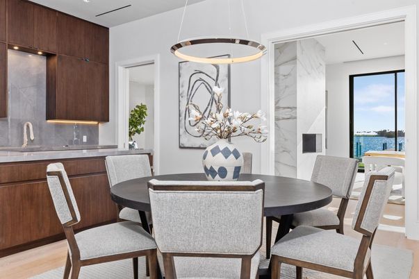 Dining room, Interior, Marble Walls, Pendant Lights, Recessed Lighting, Water, Wood Texture Flooring