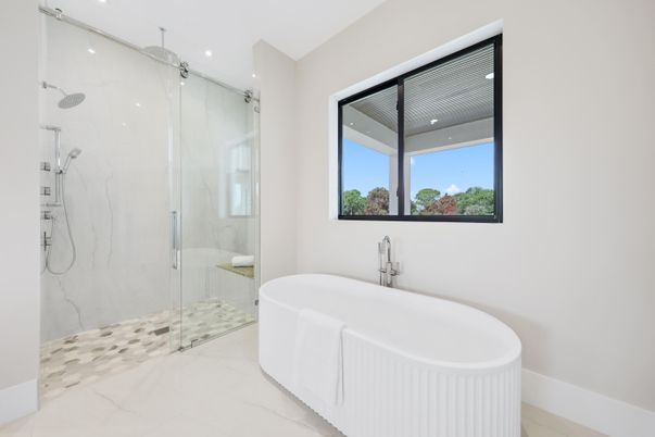 Bathroom, Free Standing Baths, Glass Shower, Interior, Marble, Marble Walls, Recessed Lighting