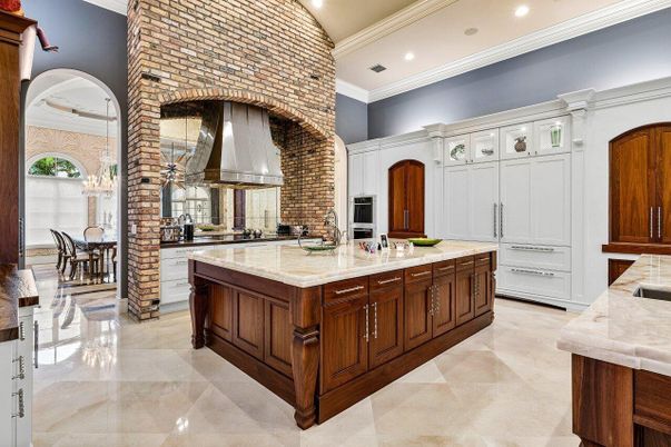 Dining room, Fireplace, Interior, Kitchen, Pendant Lights, Recessed Lighting, Stainless Steel Appliances, Stone Walls