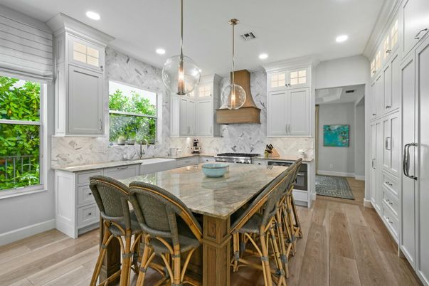 Interior, Kitchen, Marble Walls, Pendant Lights, Recessed Lighting, Stainless Steel Appliances, Wood Texture Flooring