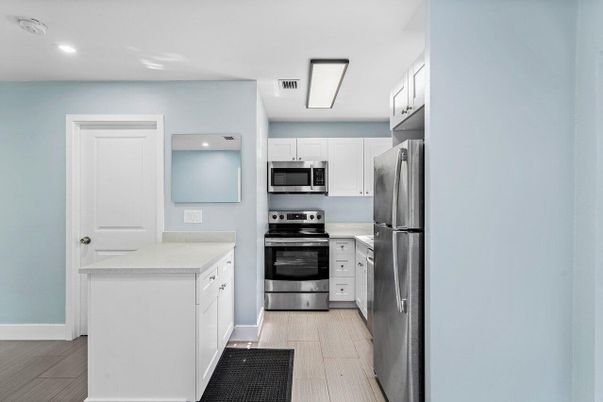 Interior, Kitchen, Recessed Lighting, Stainless Steel Appliances, Wood Texture Flooring