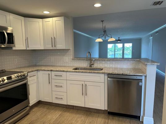 Interior, Kitchen, Pendant Lights, Recessed Lighting, Stainless Steel Appliances, Wood Texture Flooring