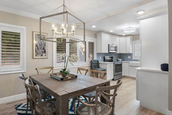 Dining room, Interior, Kitchen, Pendant Lights, Recessed Lighting, Stainless Steel Appliances, Wood Texture Flooring