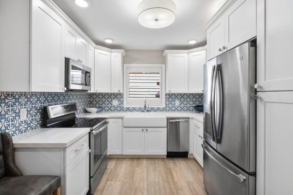 Interior, Kitchen, Recessed Lighting, Stainless Steel Appliances, Wood Texture Flooring