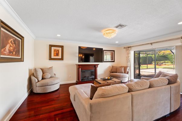 Chandelier, Fireplace, Interior, Living room, Recessed Lighting, Wood Texture Flooring