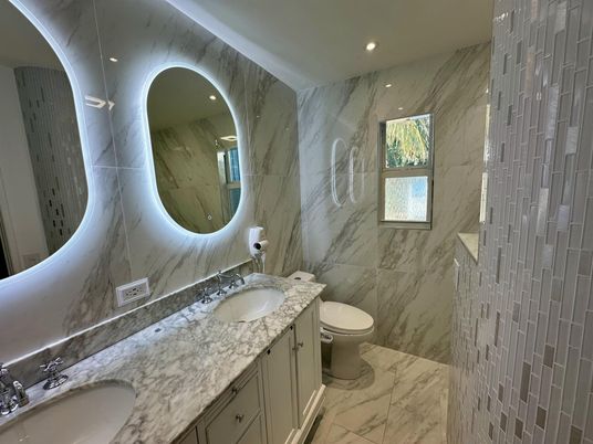 Bathroom, Dual Sink Vanities, Interior, Marble, Marble Walls, Recessed Lighting