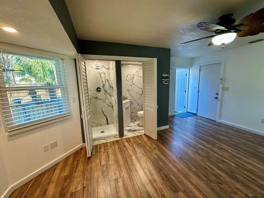 Bathroom, Empty room, Interior, Marble Walls, Recessed Lighting, Wood Texture Flooring