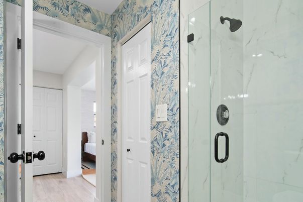Bathroom, Glass Shower, Interior, Marble Walls, Wood Texture Flooring