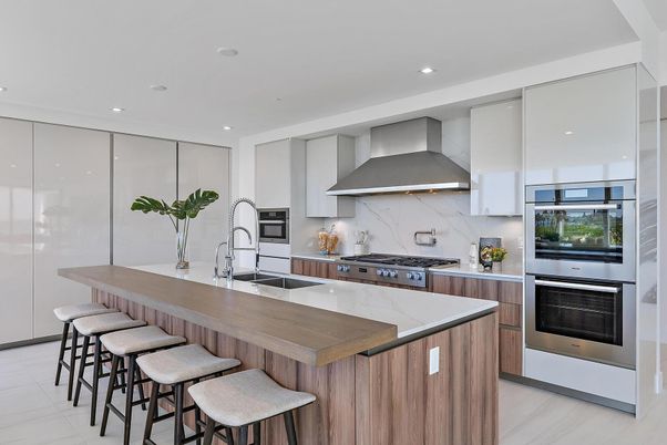 Interior, Kitchen, Marble Walls, Recessed Lighting, Stainless Steel Appliances