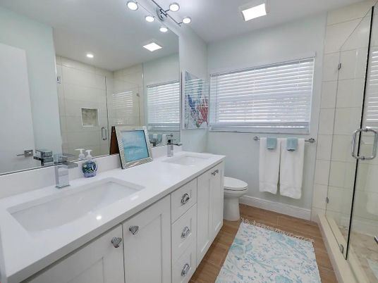Bathroom, Dual Sink Vanities, Glass Shower, Interior, Recessed Lighting, Wood Texture Flooring