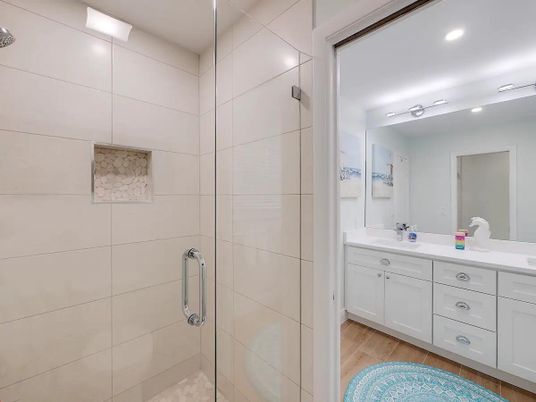 Bathroom, Dual Sink Vanities, Glass Shower, Interior, Recessed Lighting, Wood Texture Flooring