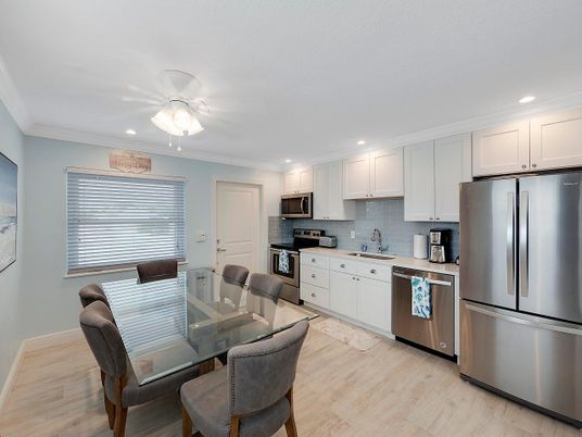Dining room, Interior, Kitchen, Recessed Lighting, Stainless Steel Appliances, Wood Texture Flooring