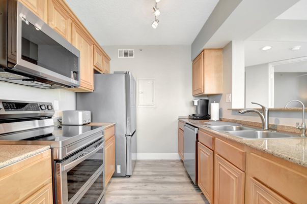 Interior, Kitchen, Recessed Lighting, Stainless Steel Appliances, Wood Texture Flooring