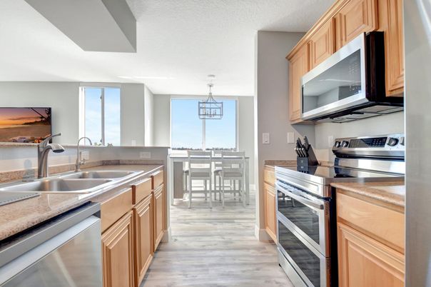 Dining room, Interior, Kitchen, Pendant Lights, Stainless Steel Appliances, Wood Texture Flooring