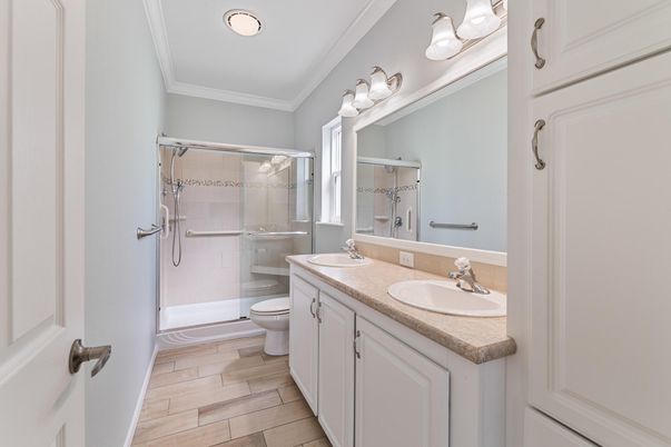 Bathroom, Dual Sink Vanities, Glass Shower, Interior, Wood Texture Flooring