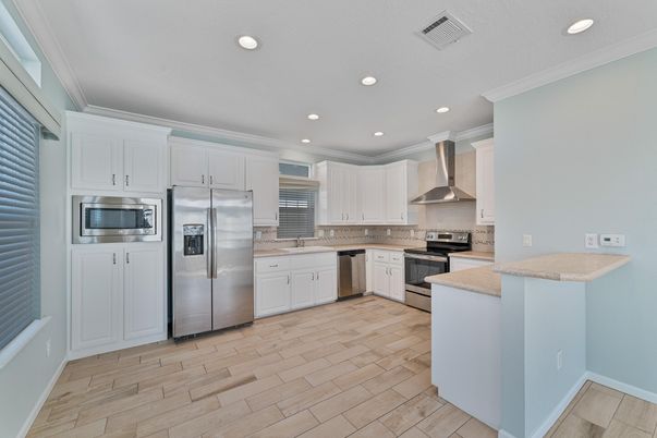 Interior, Kitchen, Recessed Lighting, Stainless Steel Appliances, Wood Texture Flooring