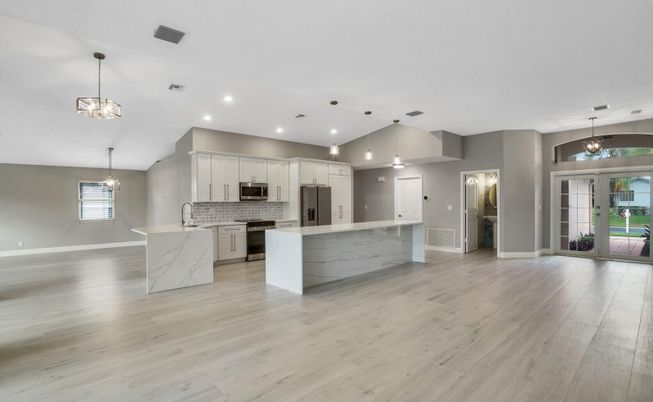 Interior, Kitchen, Pendant Lights, Recessed Lighting, Stainless Steel Appliances, Wood Texture Flooring