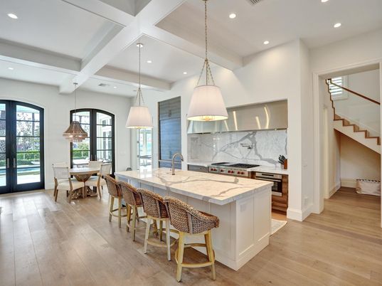 Dining room, Interior, Kitchen, Marble Walls, Pendant Lights, Recessed Lighting, Stainless Steel Appliances, Wood Texture Flooring