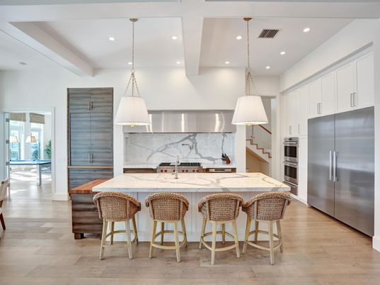 Interior, Kitchen, Marble Walls, Pendant Lights, Recessed Lighting, Stainless Steel Appliances, Wood Texture Flooring