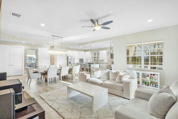 Chandelier, Dining room, Interior, Kitchen, Living room, Pendant Lights, Recessed Lighting, Stainless Steel Appliances, Wood Texture Flooring