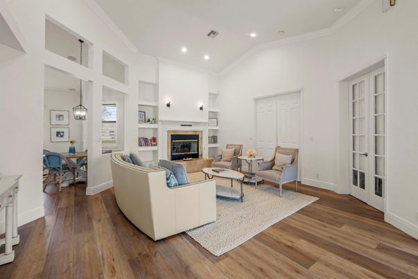 Dining room, Fireplace, Interior, Living room, Pendant Lights, Recessed Lighting, Wood Texture Flooring