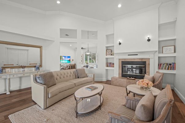 Dining room, Fireplace, Interior, Living room, Pendant Lights, Recessed Lighting, Wood Texture Flooring