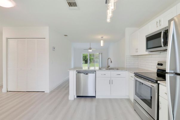 Interior, Kitchen, Pendant Lights, Stainless Steel Appliances, Wood Texture Flooring