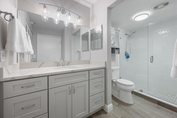 Bathroom, Dual Sink Vanities, Glass Shower, Interior, Wood Texture Flooring