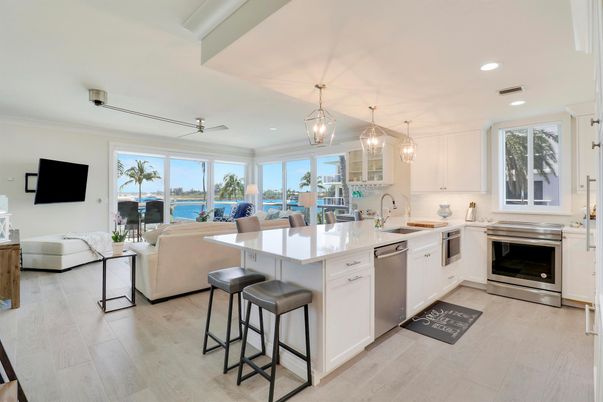Interior, Kitchen, Living room, Pendant Lights, Recessed Lighting, Stainless Steel Appliances, Water, Wood Texture Flooring