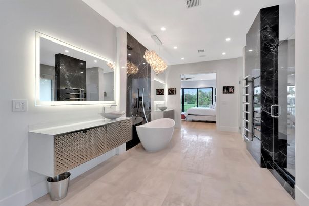 Bathroom, Chandelier, Dual Sink Vanities, Free Standing Baths, Interior, Marble Walls, Recessed Lighting