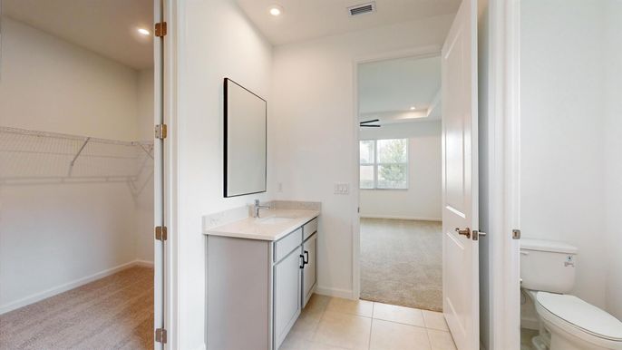 Bathroom, Dual Sink Vanities, Interior, Recessed Lighting, Walk-in Closets