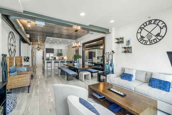 Chandelier, Dining room, Interior, Kitchen, Living room, Pendant Lights, Recessed Lighting, Stainless Steel Appliances, Wooden Ceilings, Wood Texture Flooring