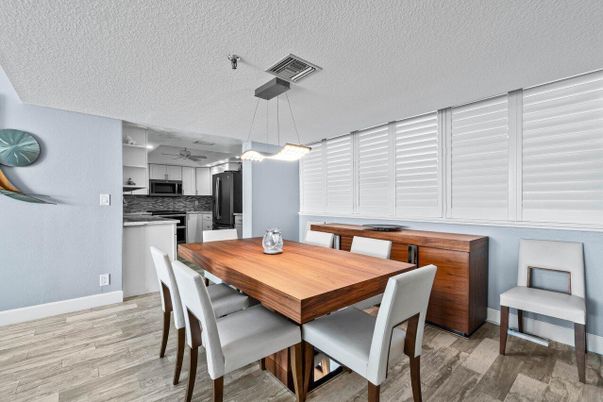 Dining room, Interior, Kitchen, Pendant Lights, Stainless Steel Appliances, Wood Texture Flooring