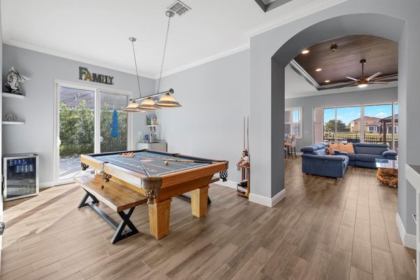 Billiard Table, Game Room, Interior, Living room, Pendant Lights, Recessed Lighting, Wood Texture Flooring