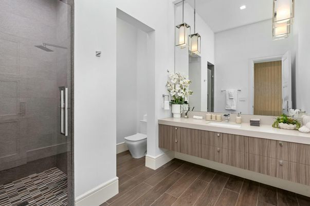 Bathroom, Glass Shower, Interior, Pendant Lights, Recessed Lighting, Wood Texture Flooring