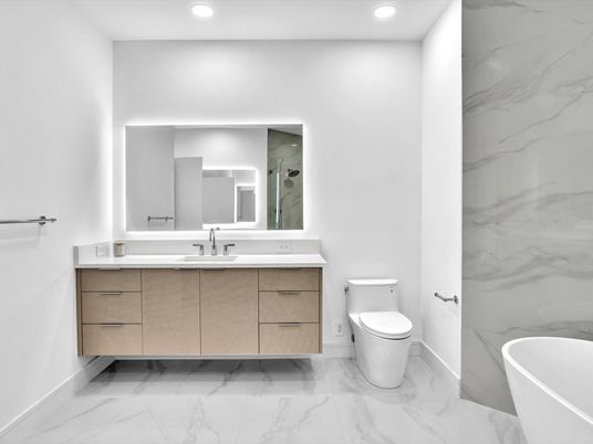 Bathroom, Dual Sink Vanities, Free Standing Baths, Interior, Marble, Marble Walls, Recessed Lighting