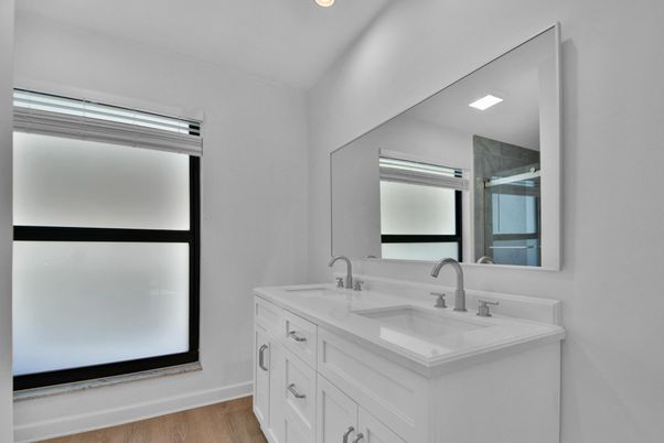 Bathroom, Dual Sink Vanities, Interior, Recessed Lighting, Wood Texture Flooring