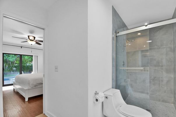 Bathroom, Bedroom, Glass Shower, Interior, Recessed Lighting, Wood Texture Flooring