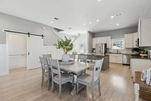 Dining room, Interior, Kitchen, Recessed Lighting, Stainless Steel Appliances, Wood Texture Flooring