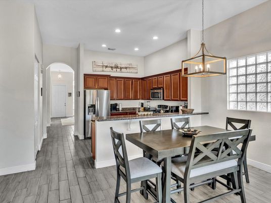Dining room, Interior, Kitchen, Pendant Lights, Recessed Lighting, Stainless Steel Appliances, Wood Texture Flooring